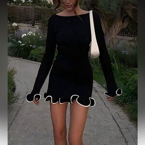 Elegant Black Dress with White Accents